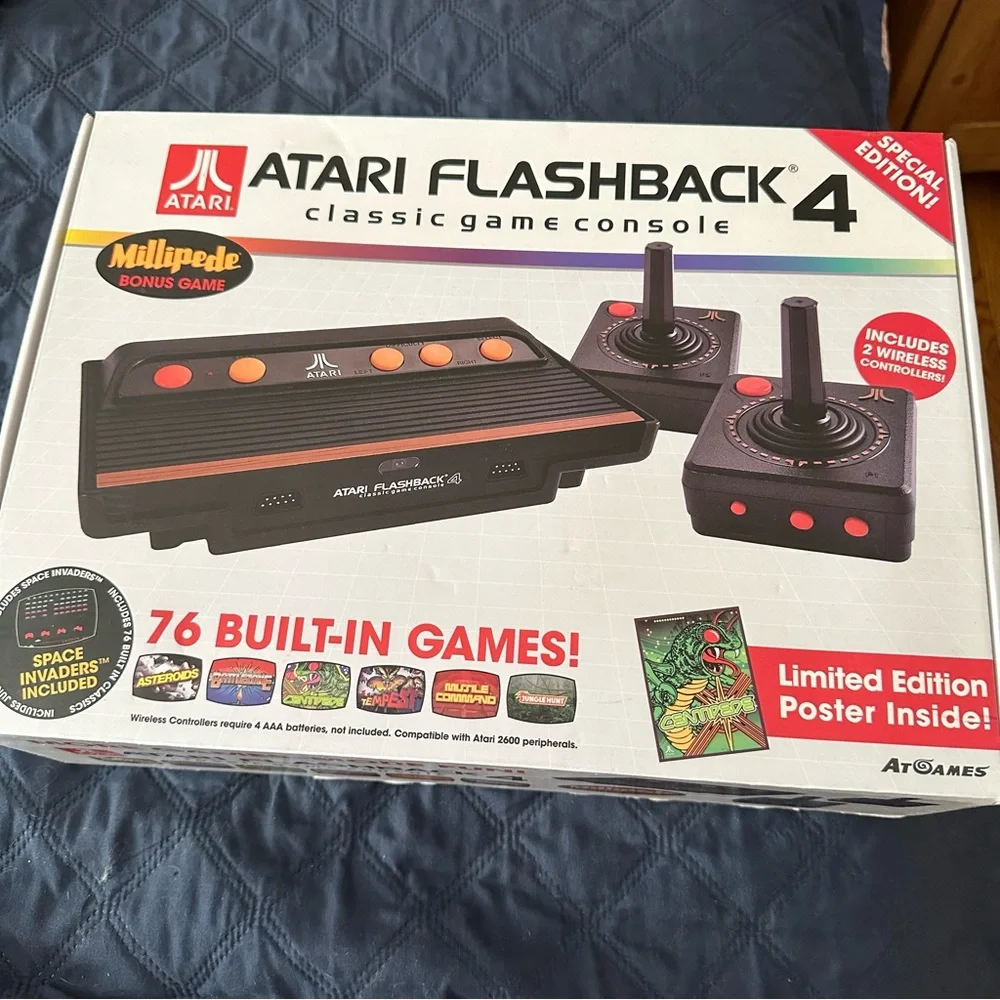 Original in the box, never opened Atari with 76 games.